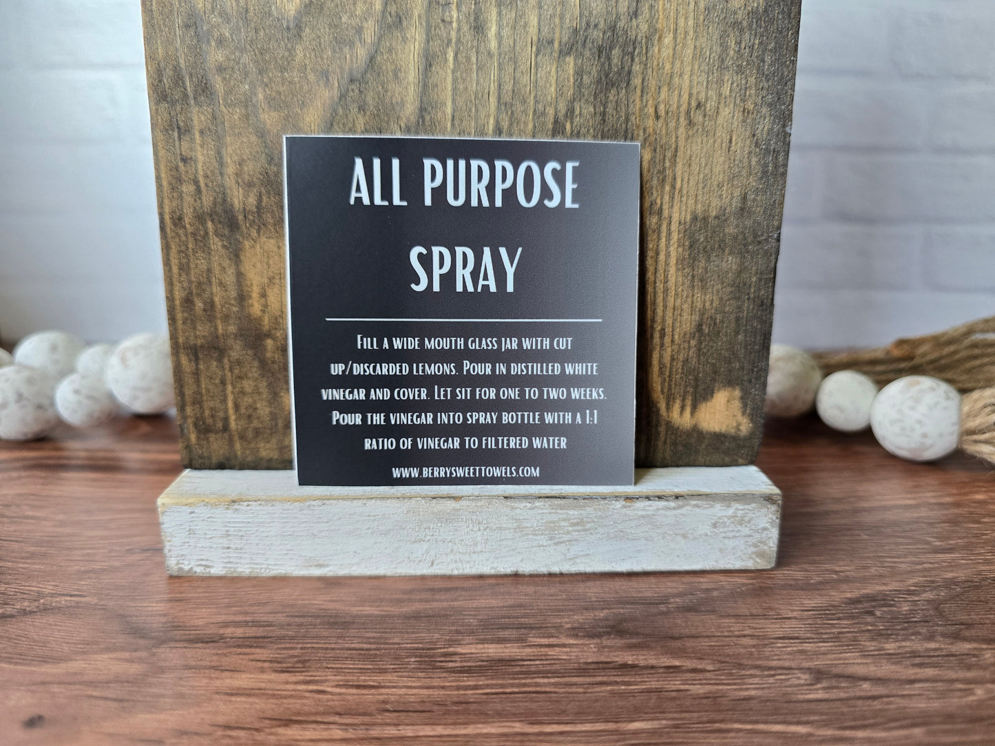 Square vinyl sticker with white text on a black background labeled “All Purpose Spray,” featuring instructions for a citrus-infused vinegar cleaning spray with a 1:1 vinegar to filtered water ratio.