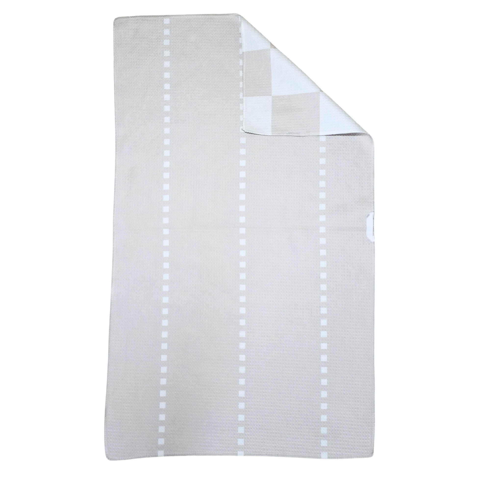 Reverse side of a double-sided waffle weave microfiber hand towel with a light beige background and evenly spaced vertical square dotted stripe details, with a folded corner showing the beige and white checkered front.